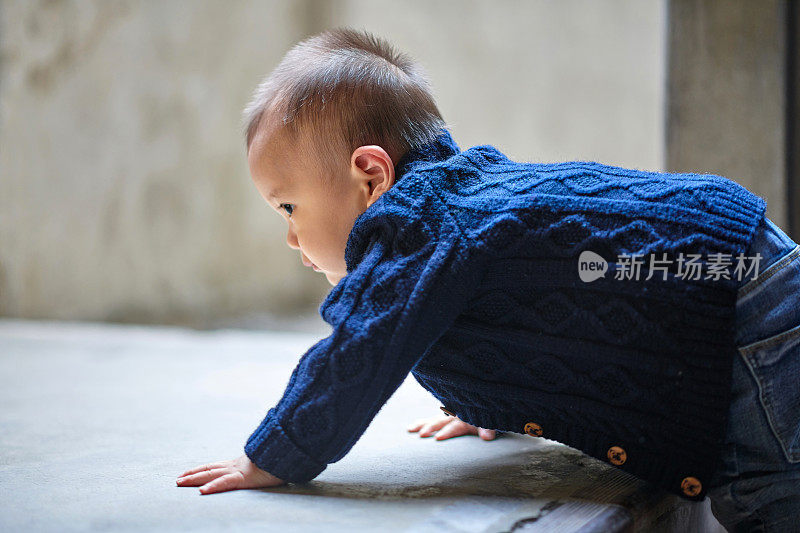 Baby Boy Studying Crawling and Climbing the Stairs